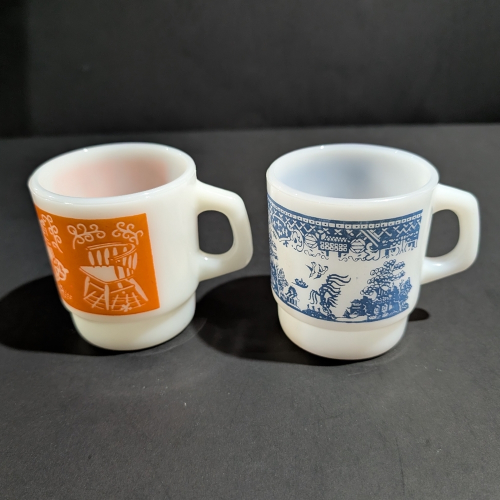 2 Vtg Anchor Hocking Milk Glass Coffee Mugs White With Orange Blue Graphics